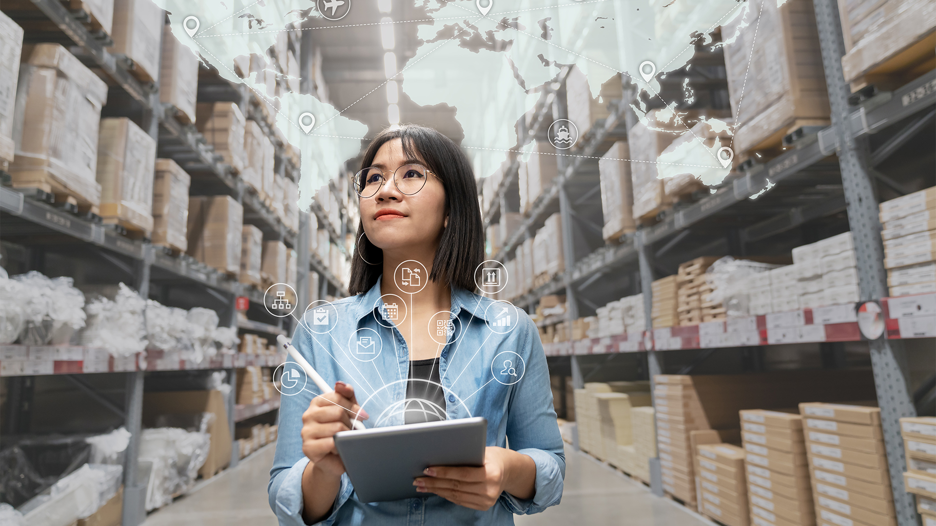 women in warehouse holding clip bored