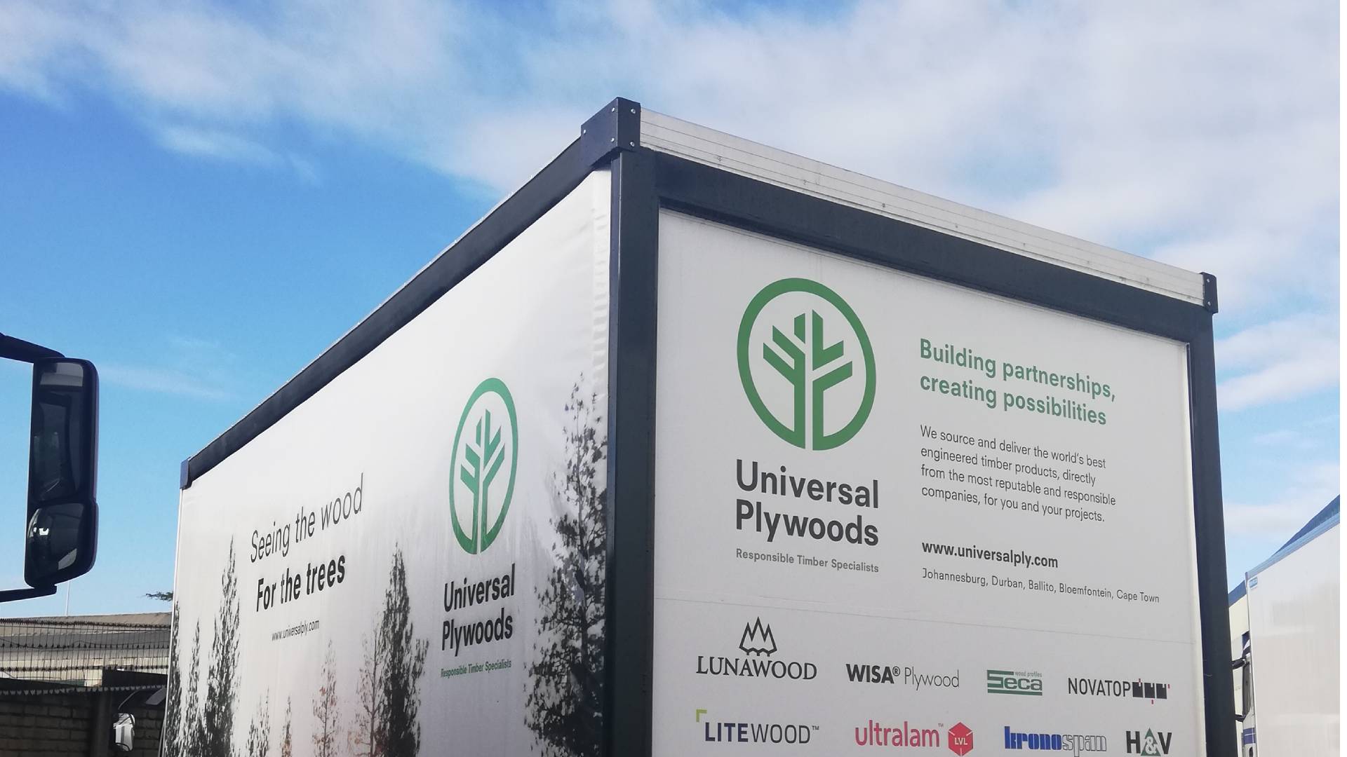Universal Plywoods sign on structure
