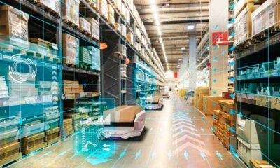 Warehouse using autonomous mobile robots (AMRS) for inventory management and transportation.
