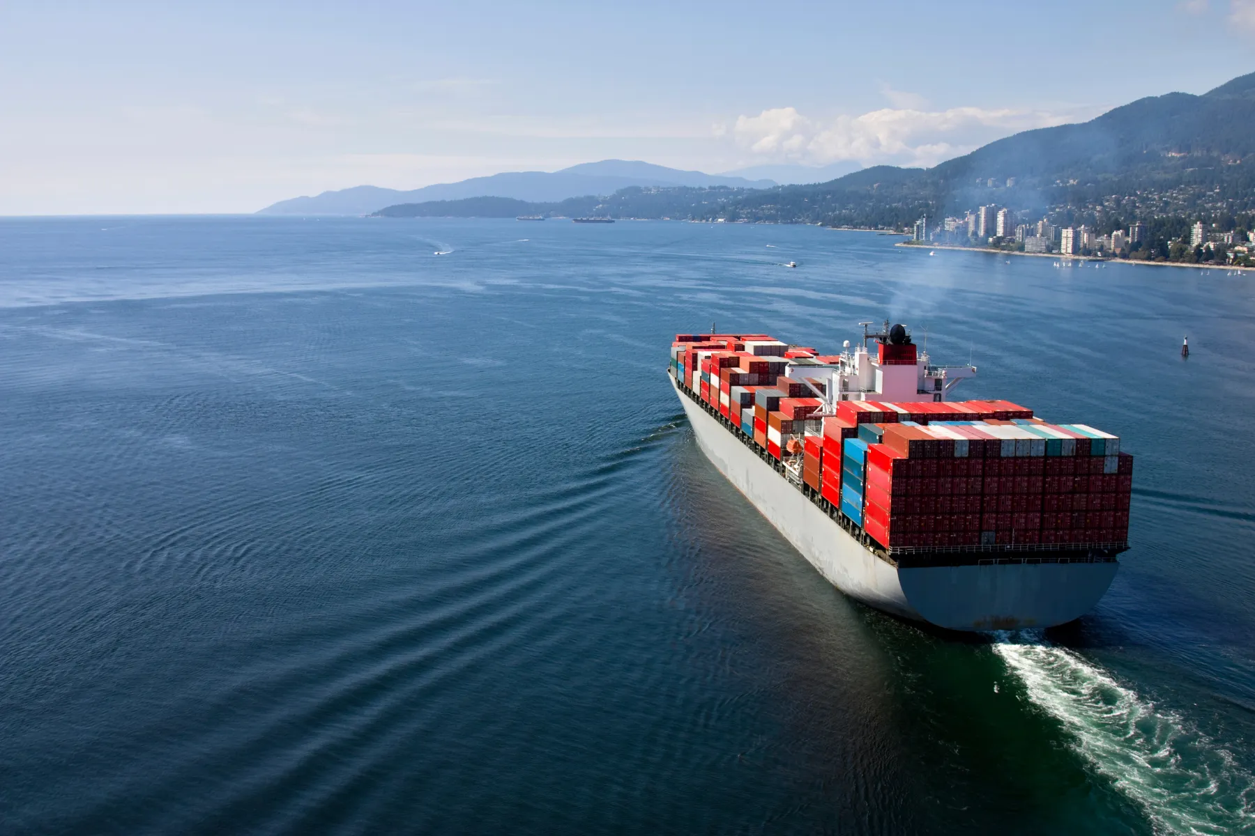 Freight forwarding shipping sailing near a metropolitan city