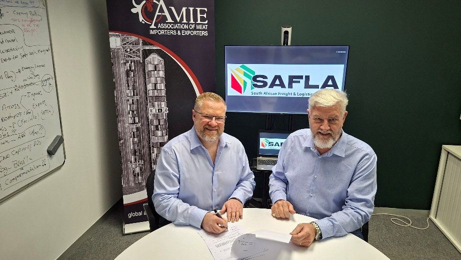 Vice Chair of SAFLA, John McDonald, with Paul Matthew, CEO of AMIE SA signing an MoC agreement 