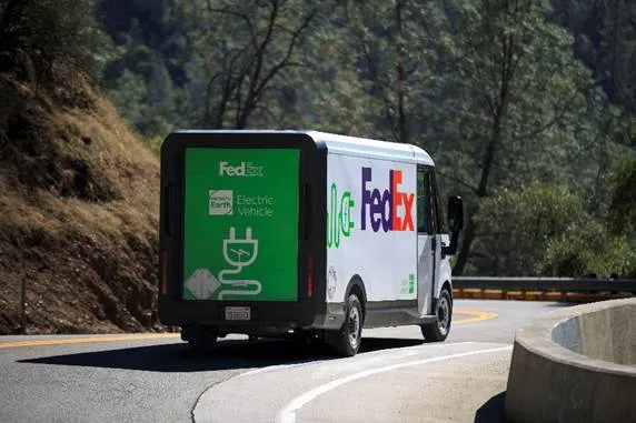 FedEx transport van travelling through the country side.