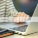 Close up of a woman searching for a logistics partner with AI search.