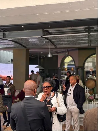 Attendees at the Runway to Railway conference networking inside the Vineyard Hotel.
