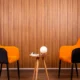 Minimalist podcast set up with wooden décor.