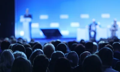 Focused image of panel discussion at a conference.