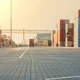 Freight truck unloading cargo in a shipping yard.